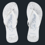 Silver Lace & Dusty Blue Script The Bride Wedding Jandals<br><div class="desc">Dance the night away with these beautiful wedding flip flops. Designed for the bride, they feature a simple yet elegant design with dusty blue script lettering on a white background and fancy silver grey lace curls and swirls. Beautiful way to stay fancy and appropriate while giving your feet a break...</div>
