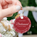 Silver Lace on Romantic Red Bridesmaid Wedding Key Ring<br><div class="desc">These beautiful bridesmaid keychains are designed to be given as a gift or wedding favour. The design is simple yet elegant and features a frilly silver grey faux foil border with pale grey text on a romantic crimson red background. There is space for her name, the wedding date and the...</div>
