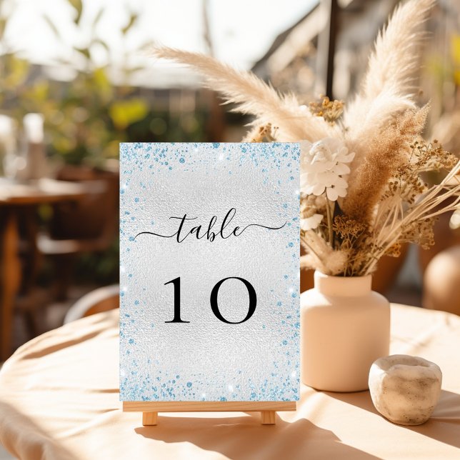 Silver light blue glitter sparkles winter table number (Creator Uploaded)