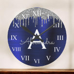 Silver Navy Blue Glitter Brushed Metal Monogram<br><div class="desc">Silver and Navy Blue Faux Foil Metallic Sparkle Glitter Brushed Metal Monogram Name and Initial Luxury Wall Clock. This makes the perfect sweet 16 birthday,  wedding,  bridal shower,  anniversary,  baby shower or bachelorette party gift for someone that loves glam luxury and chic styles.</div>