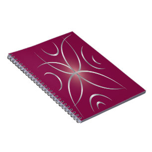 Silver on magenta notebook