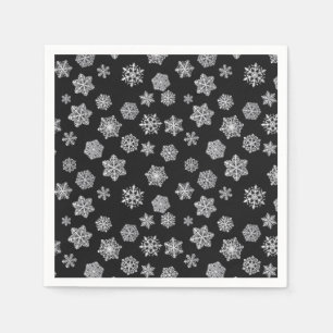 Silver snowflakes on a black background napkin