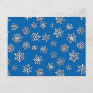 Silver snowflakes on a cobalt blue background postcard