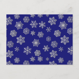 Silver snowflakes on a dark blue background postcard