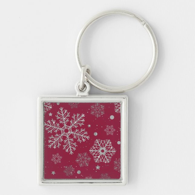 Silver snowflakes on dark red key ring (Front)