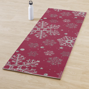 Silver snowflakes on dark red yoga mat