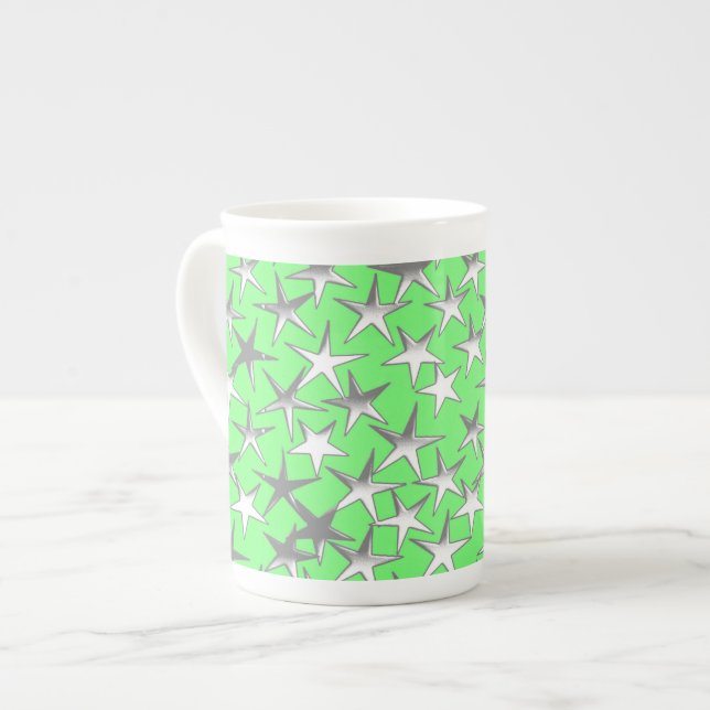Silver stars, on lime green bone china mug (Front Left)