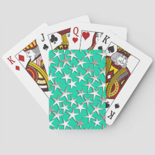 Silver stars on turquoise playing cards