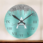 Silver Teal Glitter Brushed Metal Monogram Name<br><div class="desc">Silver and Teal Aqua Blue Faux Foil Metallic Sparkle Glitter Brushed Metal Monogram Name and Initial Luxury Wall Clock. This makes the perfect sweet 16 birthday,  wedding,  bridal shower,  anniversary,  baby shower or bachelorette party gift for someone that loves glam luxury and chic styles.</div>