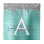 Silver Teal Glitter Brushed Metal Monogram Name Tile<br><div class="desc">Silver and Teal Aqua Blue Faux Foil Metallic Sparkle Glitter Brushed Metal Monogram Name and Initial Ceramic Tiles. This makes the perfect sweet 16 birthday,  wedding,  bridal shower,  anniversary,  baby shower or bachelorette party gift for someone that loves glam luxury and chic styles.</div>