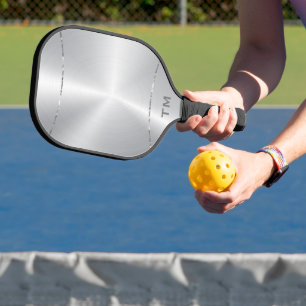 Silver tones background, shiny silver stripe pickleball paddle