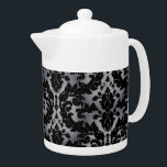 Silver Velvet Teapot<br><div class="desc">A Victorian design looks as though it is done in velvet with a silky silver background. Have your tea, or put your cream in this and feel like a queen.</div>