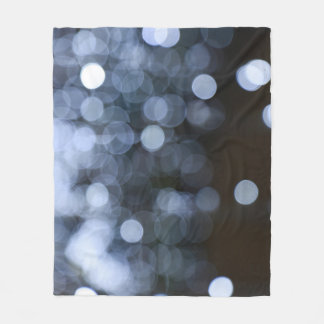 Silver, white bokeh night background. fleece blanket