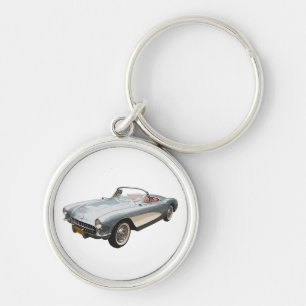 Silvery blue 1959 Corvette on white key chain. Ring