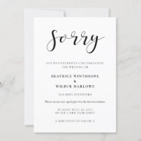 Simple and elegant Sorry wedding update card
