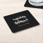 Simple Black Modern Minimalist Wedding Square Paper Coaster<br><div class="desc">A stylish simple wedding or engagement coaster design in the popular colour choice - black with light ecru text. The bride and groom's names are featured in bold typeface with a large stylish ampersand joining their names. This contemporary text is paired with simple lettering showing the wedding date. The result...</div>