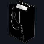 Simple Black Monogram Personalised Groomsmen Mediu Medium Gift Bag<br><div class="desc">This black personalised groomsmen gift bag features personalised groomsman's name,  and calligraphy monogram in grey colour. Change background and fonts colours easily if you like.</div>