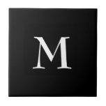 Simple BLACK monogram  Tile<br><div class="desc">Simple,  elegant BLACK ceramic tile with optional,  customisable monogram. Designed to coordinate with music notes version. Delete monogram for plain tile. Available in other colours and with matching items.</div>