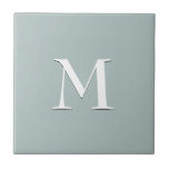 Simple blue grey monogram ceramic tile<br><div class="desc">Simple,  elegant blue grey ceramic tile with optional,  customisable monogram. Designed to coordinate with music notes version. Available in other colours and with matching items.</div>
