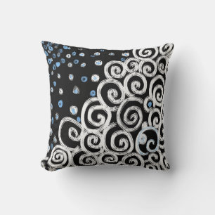 Simple bold white swirls on black linear design cushion