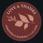 Simple Burgundy Leaves Thank You Wedding Classic Round Sticker<br><div class="desc">These thank you wedding stickers feature a simple yet elegant botanical leaf design in rich burgundy, perfect for a fall autumn wedding. Designed with a classic minimalist touch, this modern template allows you to customise the bride and groom’s names and date in white. Ideal for wedding favours and envelope seals,...</div>