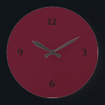 Simple Burgundy Wine & Black Large Clock<br><div class="desc">Modern clock features a minimalist design in a burgundy colour palette with black accents. A simple plain design with black numbers on a burgundy wine coloured background. A trendy addition to your kitchen, living room or office wall, a thoughtful modern office gift or modern home gift for any occasion. You...</div>
