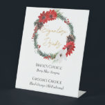 Simple Classic Christmas Wedding Signature Drinks Pedestal Sign<br><div class="desc">This simple classic Christmas wedding signature drinks pedestal sign features a clean, bright white backdrop with simple, minimalist black and gold lettering and handwritten calligraphy accents. Embellishments of beautiful and classic green and red Christmas wreaths with delicate gold features create a perfect winter holiday aesthetic while maintaining a polished elegance...</div>