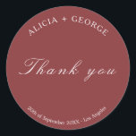 Simple elegant burgundy Wedding Thank You Classic Round Sticker<br><div class="desc">Modern classy minimalist wedding couple names sticker wedding label on a dark red burgundy background with a white chic calligraphy script.          Personalise with the bride's and groom's names and with your custom text!</div>