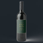 Simple Elegant Christmas Green Wedding Wine Label<br><div class="desc">This simple elegant Christmas | green wedding wine label is perfect for your minimalist modern winter wedding. The classic gold luxury calligraphy, along with the traditional green background, all bordered with a minimal frame, is sure to complete the colourful holiday vibe you're looking for. You can personalise with your own...</div>