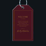 Simple Elegant Christmas | Red Wedding Welcome Gift Tags<br><div class="desc">These simple elegant Christmas | red wedding welcome gift tags are perfect for your minimalist modern winter wedding. The classic gold luxury calligraphy, along with the traditional red background, all bordered with a minimal frame, is sure to complete the colourful holiday vibe you're looking for. You can personalise with your...</div>