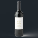 Simple Elegant Christmas White Wedding Wine Label<br><div class="desc">This simple elegant Christmas | white wedding wine label is perfect for your minimalist modern winter wedding. The classic gold luxury calligraphy, along with the traditional white background, all bordered with a minimal frame, is sure to complete the holiday vibe you're looking for. You can personalise with your own photos...</div>