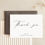 Simple Elegant Minimalist Wedding Thank You Cards<br><div class="desc">Show your appreciation with this Simple Elegant Minimalist Wedding Thank You Card. The beautiful design features a classic black and white colour scheme, with modern and minimalist typography and calligraphy. These wedding thank you cards are the perfect way to express your gratitude to your loved ones for celebrating your special...</div>