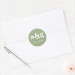 Simple, elegant monogram sage green wedding classic round sticker<br><div class="desc">Simple,  elegant monogram sage green wedding sticker. It displays your initial and the date of your wedding in white on green background. It coordinates with our "Sage green and peach seahorse" beach wedding collection.</div>