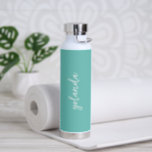 Simple Elegant Name Teal Green Turquoise Modern Water Bottle<br><div class="desc">Modern water bottle featuring a simple and minimalist design with your name in an elegant script over a teal / turquoise background.  A cute design perfect for a girly girl.</div>