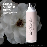 Simple Elegant Pretty Blush Pink Gift Bride to Be Water Bottle<br><div class="desc">Perfect gift for a bridal or wedding shower,  this simple and elegant water bottle is a unique and thoughtful gift.
Featuring a pale blush pink background and her future name and year of wedding.  Ideal gift for the bride to be at a bridal shower or bachelorette party.</div>