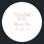 Simple Elegant Rose Gold Thank You Wedding Favour Classic Round Sticker<br><div class="desc">This simple elegant rose gold thank you wedding favour classic round sticker is perfect for your classic modern minimalist rose gold wedding. Design features classic vintage minimal chic contemporary blush gold font and delicate romantic formal calligraphy. It's excellent for spring, summer, fall, or winter luxury weddings. Keep it as is,...</div>