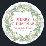 Simple Elegant Wreath Joy Modern Christmas Classic Round Sticker<br><div class="desc">Elegant Christmas sticker featuring "Merry Christmas" along with your family name and year in red surrounded by a greenery wreath.  These holiday stickers make great envelope seals for your Christmas cards or as gift tags.</div>