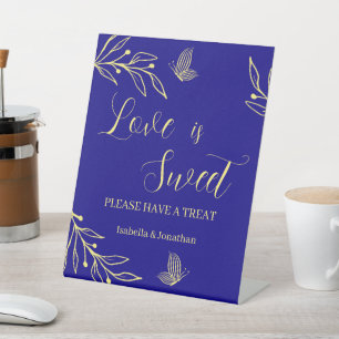 Simple gold floral royal blue wedding treat table pedestal sign
