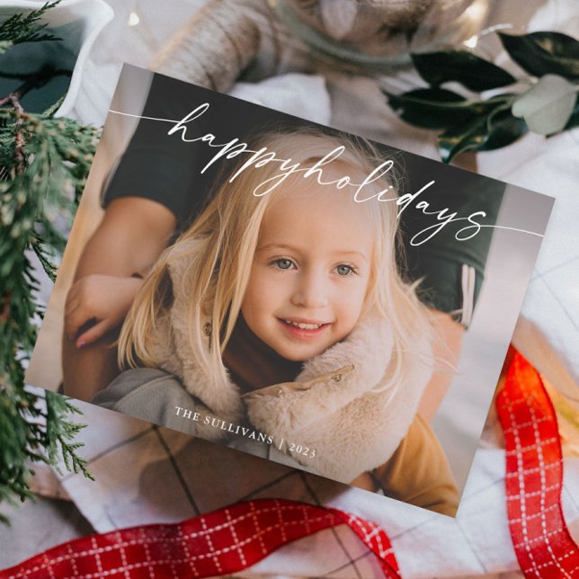 Simple Handwritten Script Photo Holiday Card (An elegant photo holiday card with modern handwritten happy holidays typographic overlay.)