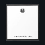 Simple Luxury Monogram Black and Silver Notepad<br><div class="desc">Elevate your note-taking game with this simple yet luxurious notepad featuring a striking black and silver colour scheme. The design showcases a classic monogram in bold block typography, personalised with your initial. Perfect for jotting down notes, ideas, or daily tasks, this notepad is a must-have accessory for any busy professional...</div>