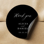 Simple minimalist elegant wedding favour classic r classic round sticker<br><div class="desc">Elegant simple minimal black and white wedding favour thank you sticker featuring a classy stylish chic trendy calligraphy script. Easy to personalise with your details! Suitable for formal black tie neutral weddings. Please note that the background colour can be changed to match your wedding colour scheme. If comfortable doing it,...</div>