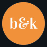 Simple Minimalist Monogram Initials Orange Wedding Classic Round Sticker<br><div class="desc">Modern,  minimal,  minimalist ,  simple wedding design with big bold letters in orange tone colour: Sunny Orange (colour,  font,  text,  size can be changed).  With date and bride and groom monograms (initials).  Stickers / seals for wedding invitation envelopes. Perfect for that young couple for fall/autumn wedding.</div>