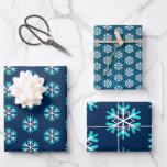 Simple modern holiday turquoise white snowflake wrapping paper sheet<br><div class="desc">A fun, playful, turquoise and white snowflake graphic pattern in three graphic sizes, on a rich dark blue and teal textured backgrounds, helps you usher in the holiday season of Christmas and Hanukkah. Feel the warmth and joy of the holidays whenever you use this stunning, chic, modern, holiday wrapping paper....</div>