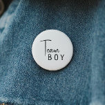 Simple Modern Neutral Gender Reveal Team Boy 6 Cm Round Badge<br><div class="desc">Celebrate your little one with our simple modern neutral gender reveal team boy button, featuring a minimalist black-and-white design that is modern and pretty. With its clean, boho-inspired aesthetic, the contemporary, gender-neutral vibe is perfect for welcoming a baby boy or girl in any season—whether it's fall, winter, spring, or beyond....</div>