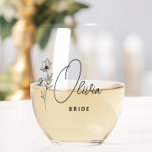 Simple Modern Personalised Bride Floral Stemless Wine Glass<br><div class="desc">Looking for a chic, trendy, yet simple gift for the bride? These wildflower floral modern script stemless wine glasses are a practical gift that she can use even after her wedding day! All text, including title and script names, can be changed. You can change the title to fit the whole...</div>