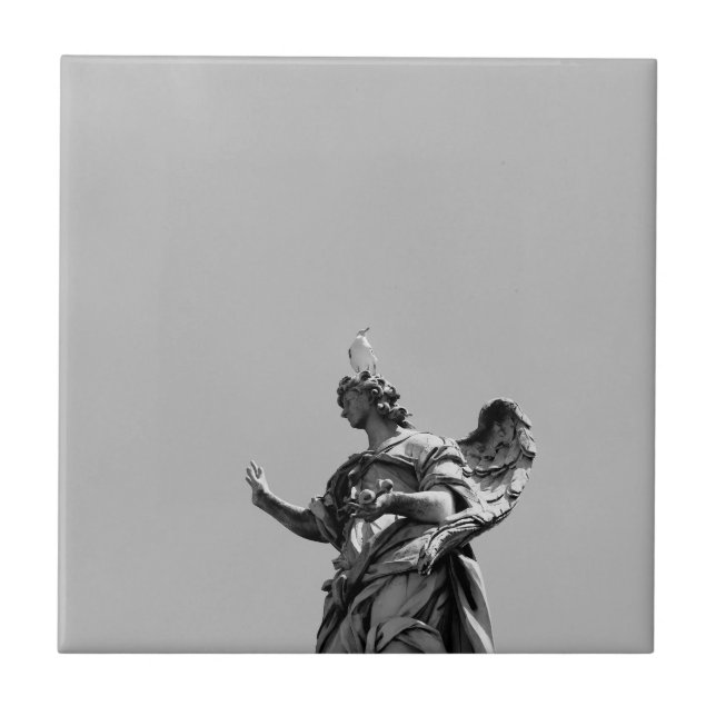 Simple, modern photo of seagull on top of statue tile (Front)