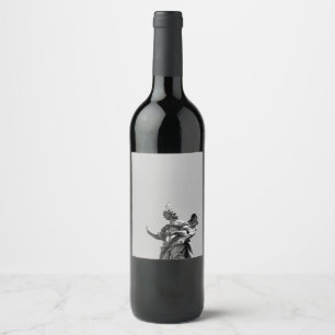 Simple, modern photo of seagull on top of statue wine label