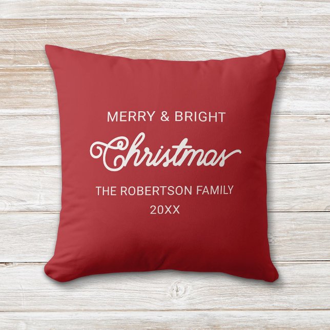 Simple Modern Script Red Merry Christmas Wishes Cushion (Red and white, modern script "Merry and Bright" Christmas pillow with custom family name and year.)