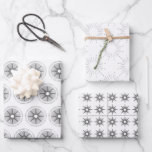 Simple Modern Silver Starburst Christmas Wrapping Paper Sheet<br><div class="desc">Simple modern silver starburst Christmas wrapping paper sheets. Simple modern silver star designs with complimentary design elements in a traditional silver and white holiday colour palette.</div>