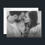 Simple modern stylish photo save the date announcement postcard<br><div class="desc">This simple but stylish photo save the date postcard is the perfect way to announce your engagement and upcoming wedding to friends and family. The front of this horizontal save the date features a modern type treatment in white at the bottom of a single photo. The back features a second...</div>